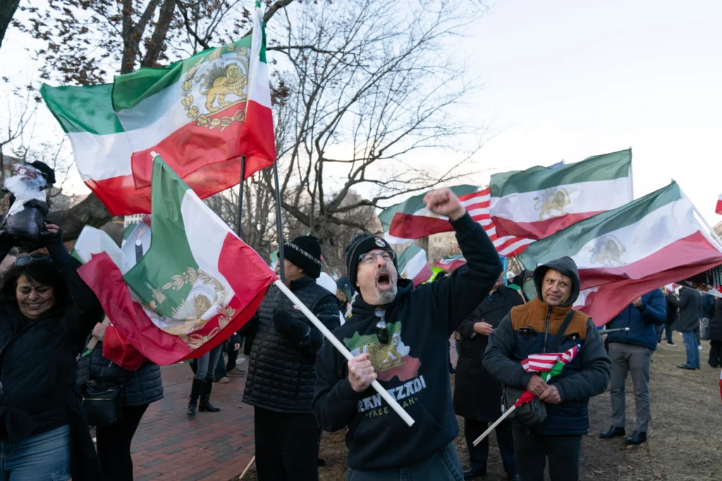  Activists take part in a rally supporting protesters in Iran at Lafayette Park, across from the White House, in Washington, Sunday, Jan. 11, 2026. (AP Photo/Jose Luis Magana)