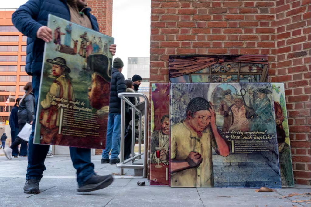Workers remove display panels about slavery at the President’s House site in Independence National Historical Park Thursday, Jan. 22, 2026. Tom Gralish / Staff Photographer