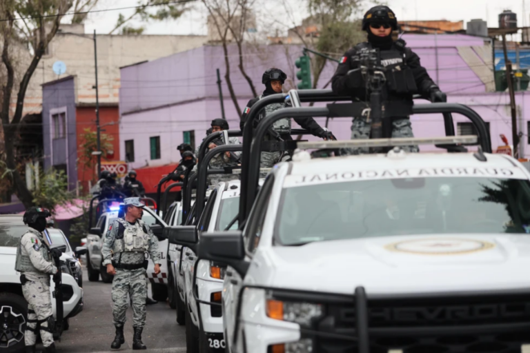 National Guards patrol the area outside of the General Prosecutor’s headquarters in Mexico City, Sunday, Feb. 22, 2026, after authorities reported that the Mexican Army killed Jalisco New Generation Cartel leader Nemesio Oseguera, known as “El Mencho.” (AP Photo/Ginette Riquelme)