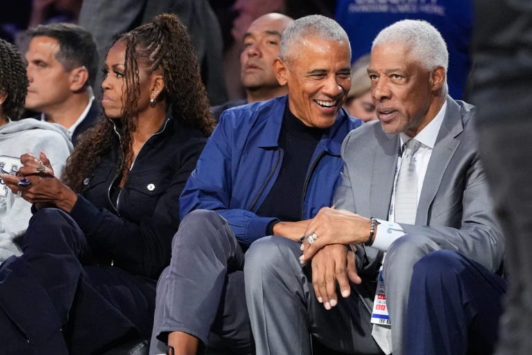 Barack Obama talks to Julius Erving during the NBA All-Star basketball game Sunday, Feb. 15, 2026, in Inglewood, Calif. (AP Photo/Mark J. Terrill)