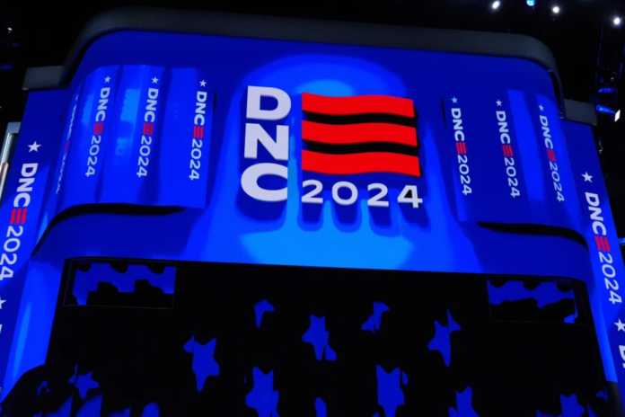 Part of the stage with the DNC logo is seen at the Democratic National Convention Thursday, Aug. 22, 2024, in Chicago. (AP Photo/Brynn Anderson, File)