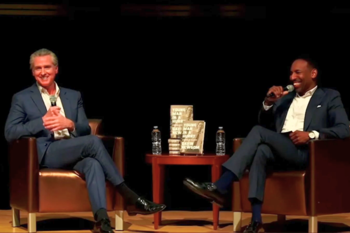 Newsom was in Georgia for the launch of his memoir, Young Man in a Hurry, seated alongside Atlanta Mayor Andre Dickens. Screenshot