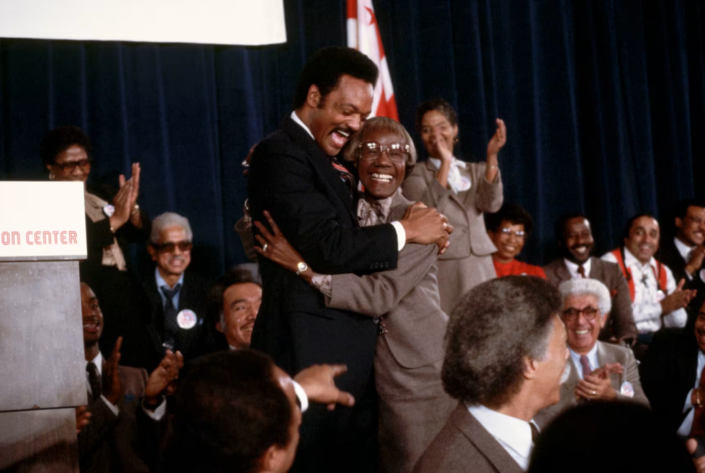 Jesse Jackson hugs former New York congresswoman Shirley Chisholm after announcing his candidacy for president in 1983.Jacques M. Chenet / Corbis via Getty Images file