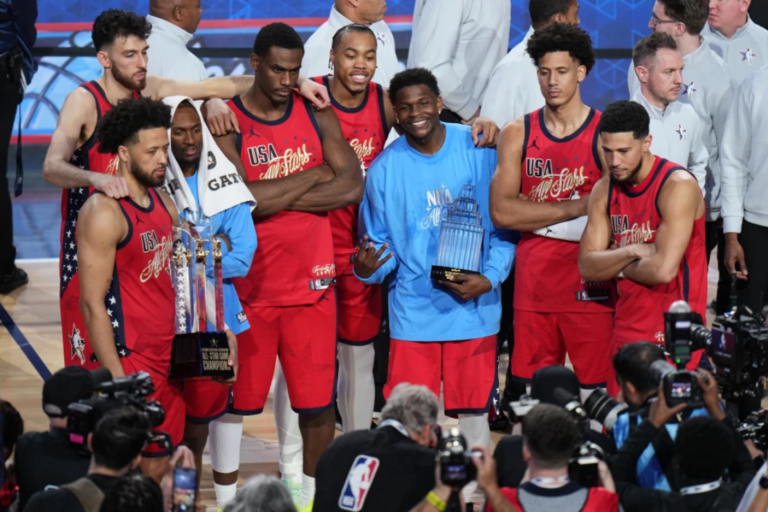 USA Stars pose for photos after a win ver USA Stripes in the NBA All-Star game Sunday, Feb. 15, 2026, wood, Calif. (AP Photo/Jae C.)