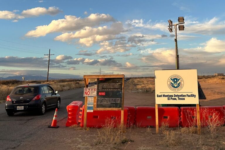 A sign marks the entrance to a series of hardened tents at the Camp East Montana immigrant detention center in the desert at a U.S. Army base on the outskirts of El Paso, Texas, Friday, Feb. 13, 2026. (AP Photo/Morgan Lee)