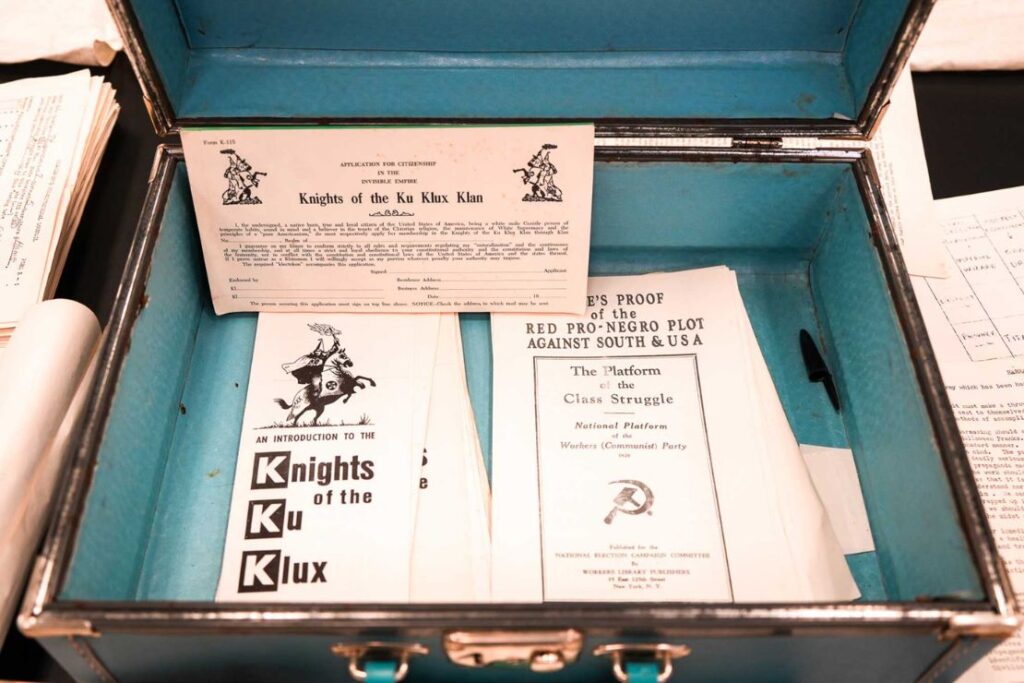The Mississippi Department of Public Safety announced on March 24, 2026, that staff had found this blue briefcase in a closet, which included an assortment of Ku Klux Klan materials, including Klan propaganda materials like these phamplets. Photo courtesy Mississippi Department of Public Safety