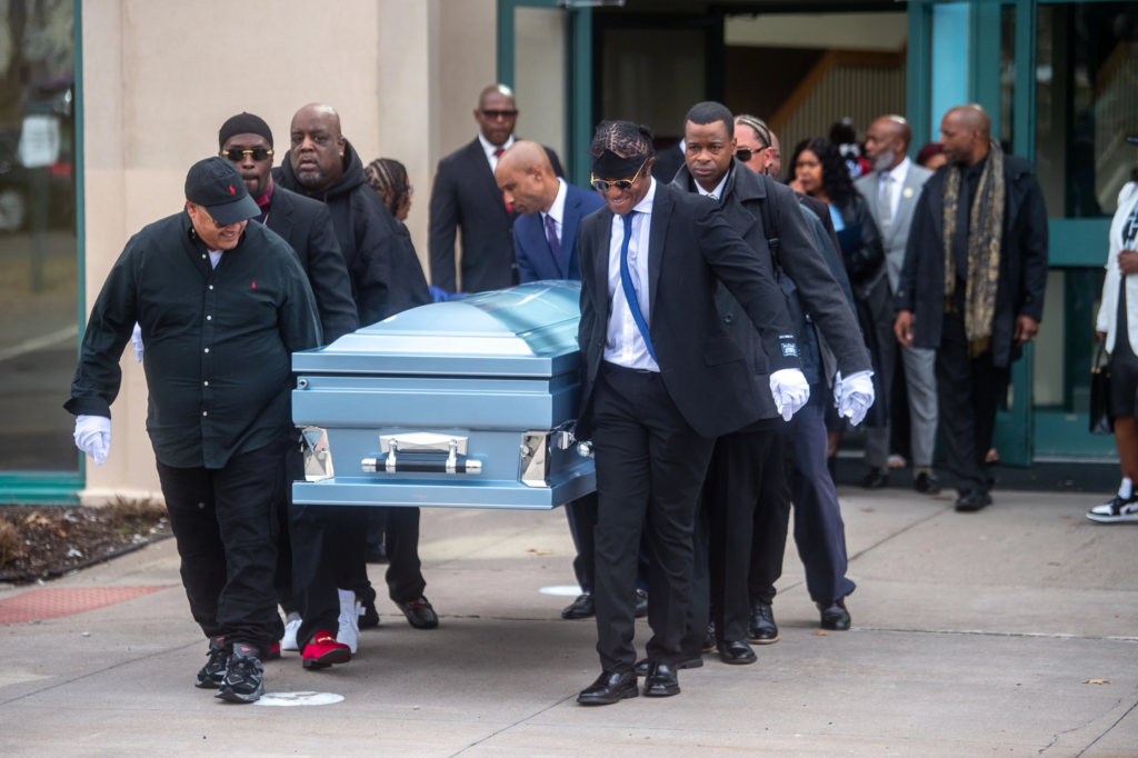 Pallbearers carry out the casket of Steven Jones, a man in a mental health crisis who was shot by police, following Jones’s funeral service at The First Cathedral, Thursday, March 26, 2026 in Bloomfield, Conn. (Aaron Flaum/Hartford Courant via AP)