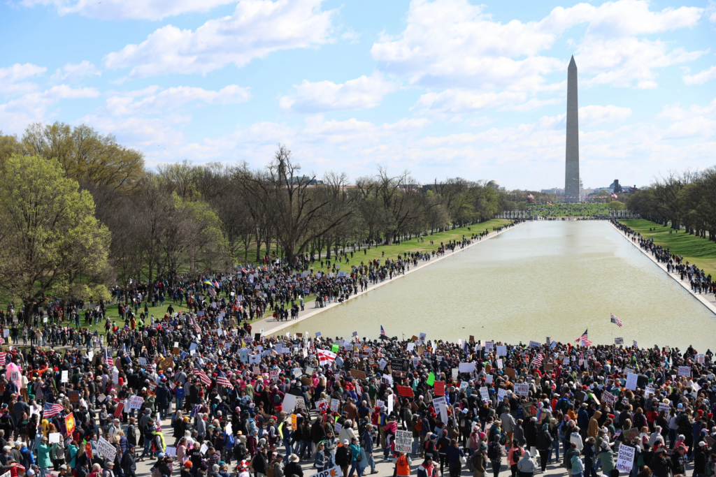 Demonstrators rally in front of the Lincoln Memorial during the No Kings protest in Washington, Saturday, March 28, 2026. (AP Photo/Tom Brenner)