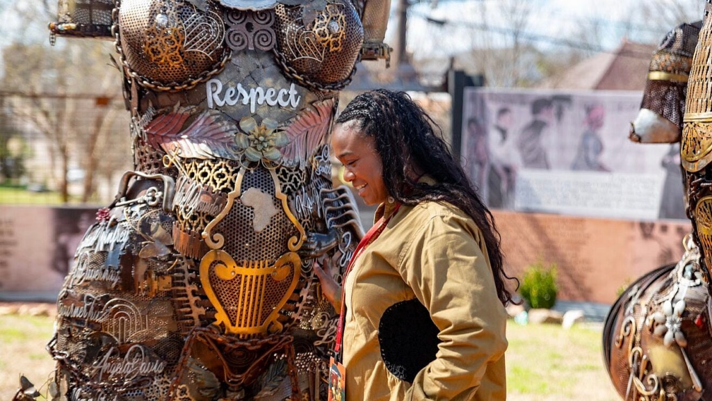 Tatyana Ali visiting The Mothers of Gynecology Monument. (Photo credit: The More Up Campus)