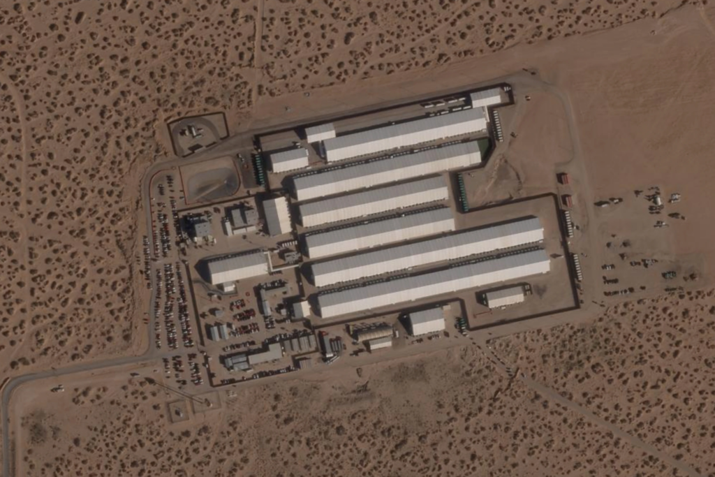 This Wednesday, March 4, 2026, satellite image provided by Planet Labs shows the large white tents and steel fencing at Camp East Montana, an immigrant detention center built by the Trump administration at Fort Bliss, a U.S. Army base outside El Paso, Texas. (Planet Labs via AP)