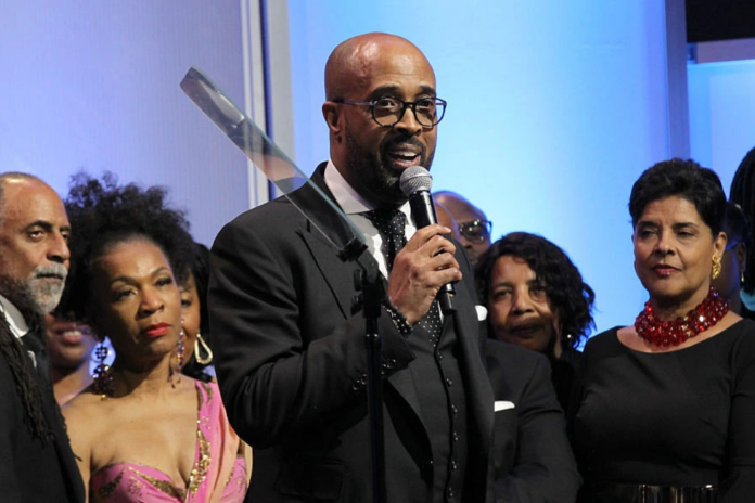 Dr. Frederick Douglass Haynes III (C) speaks onstage during the National CARES Mentoring Movement 4th Annual For The Love Of Our Children Gala at The Ziegfeld Ballroom on February 11, 2019 in New York City. (Photo by Bennett Raglin/Getty Images for Gala for National CARES Mentoring Movement)