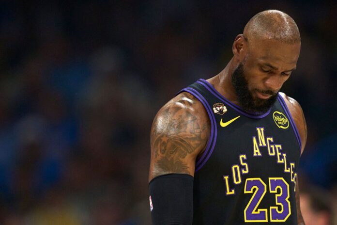 LeBron James #23 of the Los Angeles Lakers looks on against the Oklahoma City Thunder at the Paycom Center on April 2, 2026 in Oklahoma City, Oklahoma. NOTE TO USER: User expressly acknowledges and agrees that, by downloading and or using this photograph, User is consenting to the terms and conditions of the Getty Images License Agreement. (Photo by Cooper Neill/Getty Images)