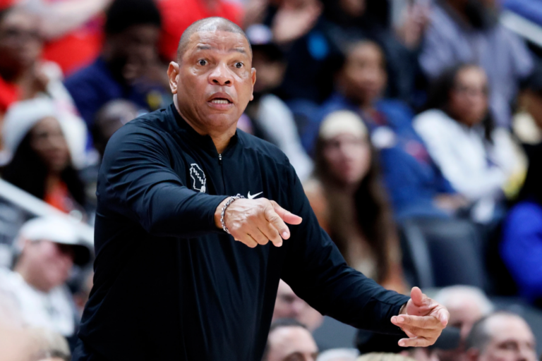 Milwaukee Bucks head coach Doc Rivers directs his payers against the Detroit Pistons during the first half of an NBA basketball game Wednesday, April 8, 2026, in Detroit. (AP Photo/Duane Burleson)