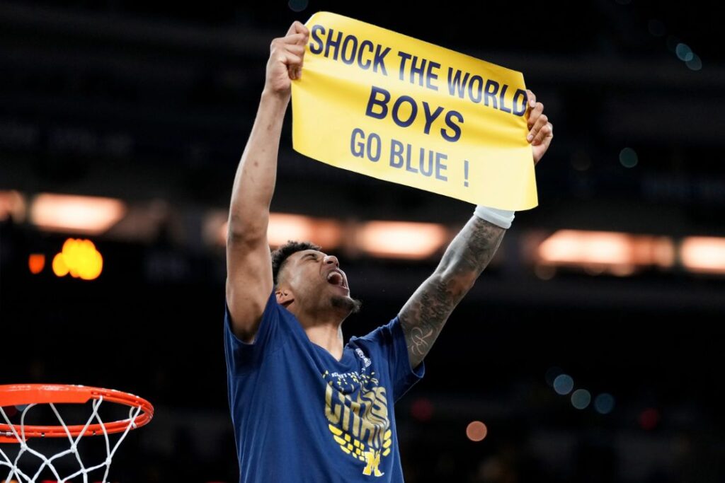 Michigan forward Yaxel Lendeborg celebrates after defeating UConn in the
NCAA college basketball tournament national championship game at the Final Four, Monday, April 6, 2026, in Indianapolis. (AP Photo/Abbie Parr)