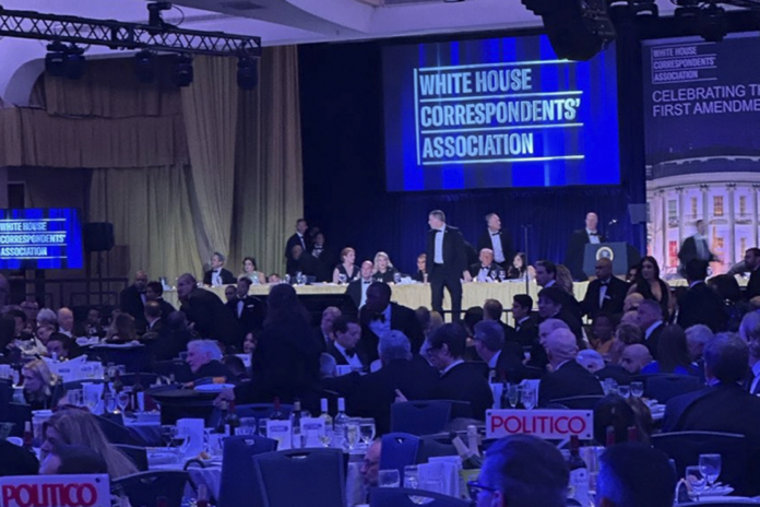 Secret service agents respond during the White House Correspondents Dinner, Saturday, April 25, 2026, in Washington. (AP Photo/Tom Brenner)