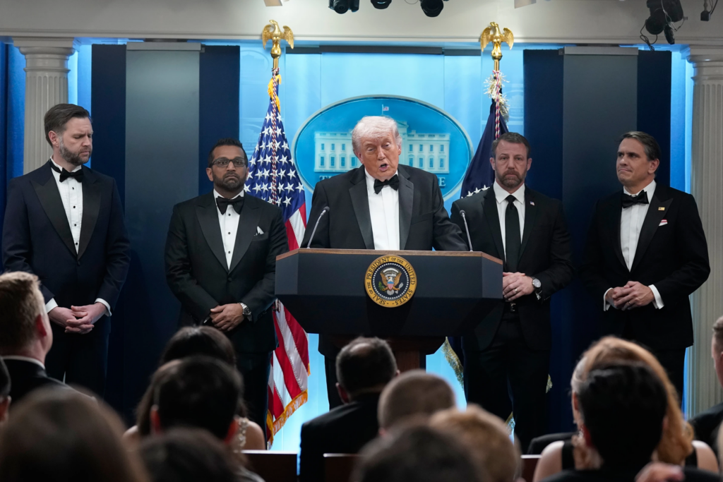 President Donald Trump speaks in the James Brady Press Briefing Room at the White House after an unspecified threat at the annual White House Correspondents’ Association Dinner in Washington, Saturday, April 25, 2026, as Vice President JD Vance, FBI director Kash Patel, Homeland Security Secretary Markwayne Mullin and acting Attorney General Todd Blanche listen. (AP Photo/Jose Luis Magana)