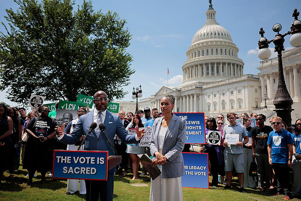 Sen. Raphael Warnock (D-GA) and Maya Wiley, president and CEO of the Leadership Conference on Civil and Human Rights, join civil rights and voting rights advocates to reintroduce the John R. Lewis Voting Rights Advancement Act outside the U.S. (Photo by Chip Somodevilla/Getty Images)