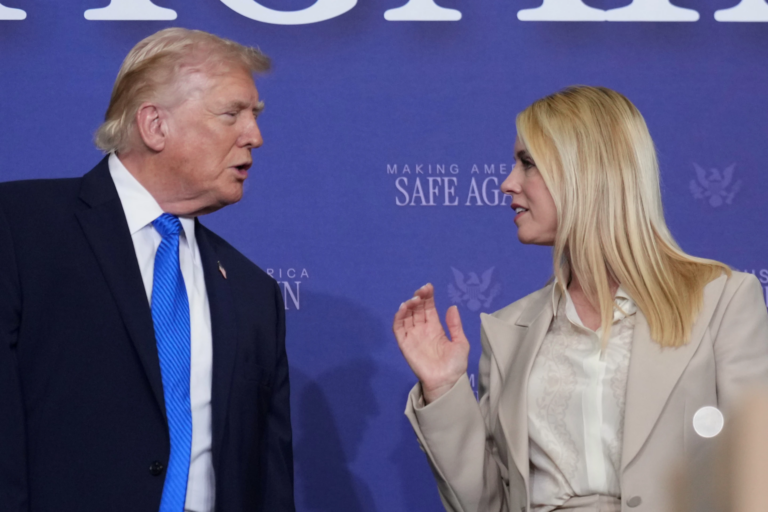 Donald Trump speaks with Attorney General Pam Bondi during a roundtable discussion on public safety at a Tennessee Air National Guard Base, Monday, March 23, 2026, in Memphis, Tenn. (AP Photo/Mark Schiefelbein)