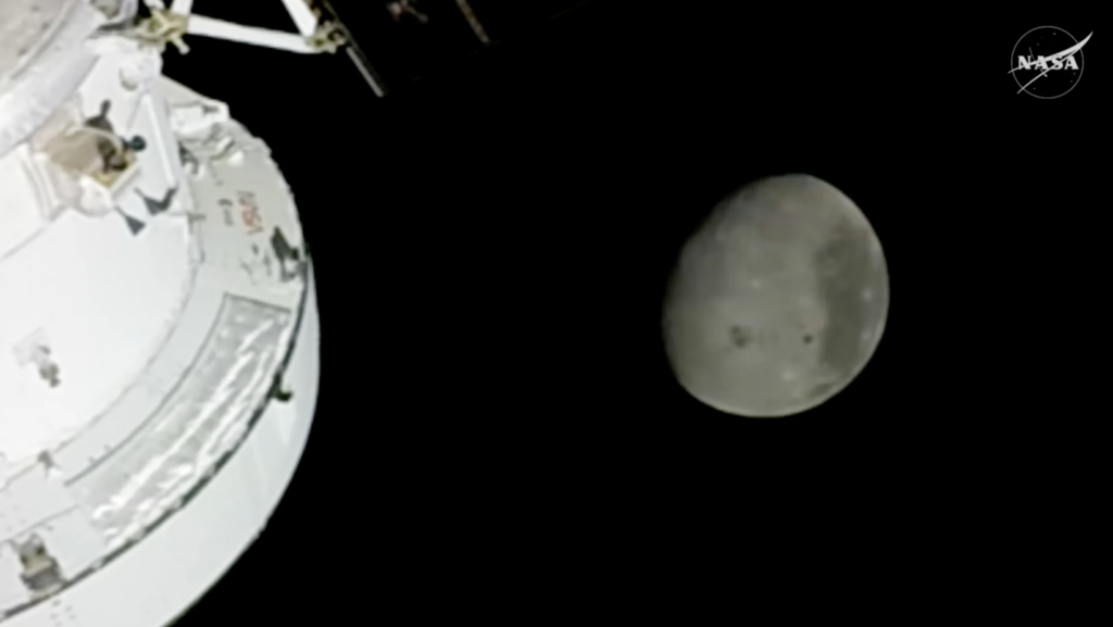 In this image from video provided by NASA, the Moon is seen from a camera outside the Orion Spacecraft after the Artemis II astronauts surpassed the farthest distance ever traveled by humans from Earth, Monday, April 6, 2026. (NASA via AP) This image provided by NASA Monday, April 6, 2026, shows the Moon, the near side (the hemisphere we see from Earth) visible at the top half of the disk, identifiable by the dark splotches. At the lower center is Orientale basin, a nearly 600-mile-wide crater that straddles the Moon’s near and far sides. Everything below the crater is the far side. (NASA via AP) 6 of 9 | This image provided by NASA Monday, April 6, 2026, shows the Moon, the near side (the hemisphere we see from Earth) visible at the top half of the disk, identifiable by the dark splotches. At the lower center is Orientale basin, a nearly 600-mile-wide crater that straddles the Moon’s near and far sides. Everything below the crater is the far side. (NASA via AP) In this photo provided by NASA, Artemis II commander and NASA astronaut Reid Wiseman looks out one of the Orion spacecraft's main cabin windows at the Moon ahead of the crew's lunar flyby on April 6, 2026. (NASA via AP) 7 of 9 | In this photo provided by NASA, Artemis II commander and NASA astronaut Reid Wiseman looks out one of the Orion spacecraft’s main cabin windows at the Moon ahead of the crew’s lunar flyby on April 6, 2026. (NASA via AP) In this photo provided by NASA, Artemis II pilot and NASA astronaut Victor Glover peers out one of the Orion spacecraft's windows looking back at Earth ahead of the crew's lunar flyby, Monday, April 6, 2026.(NASA via AP) 8 of 9 | In this photo provided by NASA, Artemis II pilot and NASA astronaut Victor Glover peers out one of the Orion spacecraft’s windows looking back at Earth ahead of the crew’s lunar flyby, Monday, April 6, 2026.(NASA via AP) This image provided by NASA Monday, April 6, 2026, shows the Moon, the near side (the hemisphere we see from Earth) visible at the right side of the disk, identifiable by the dark splotches. At lower left is Orientale basin, a nearly 600-mile-wide crater that straddles the Moon’s near and far sides. Everything to the left of the crater is the far side. (NASA via AP) 9 of 9 | This image provided by NASA Monday, April 6, 2026, shows the Moon, the near side (the hemisphere we see from Earth) visible at the right side of the disk, identifiable by the dark splotches. At lower left is Orientale basin, a nearly 600-mile-wide crater that straddles the Moon’s near and far sides. Everything to the left of the crater is the far side. (NASA via AP)