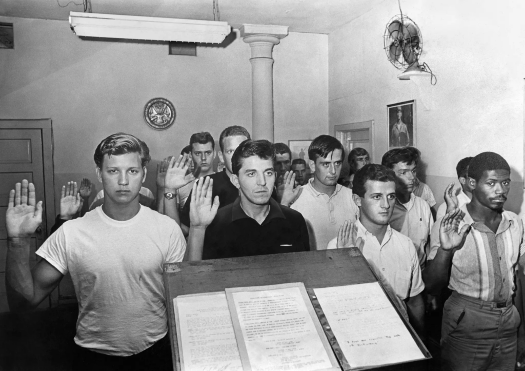 Army inductees pledged their service in New York City in 1965, while protesters burned draft cards and shouted antiwar slogans outside. The draft was abolished in 1973. Credit.Don Hogan Charles/The New York Times