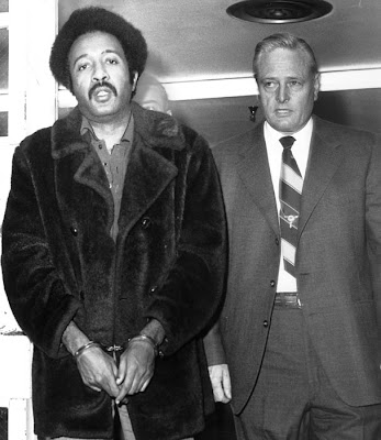 Ernest McMillan is escorted to the Dallas County Jail in handcuffs by Dallas’ deputy sheriff after being captured in Cincinnati, Ohio, December 1971. Photo courtesy of Ernest McMillan.