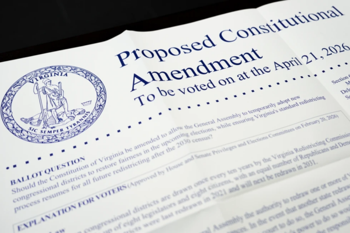 A poster on the Virginia redistricting referendum is seen during voting at Mason Square, Tuesday, April 21, 2026, in Alexandria, Va. (AP Photo/Julia Demaree Nikhinson)