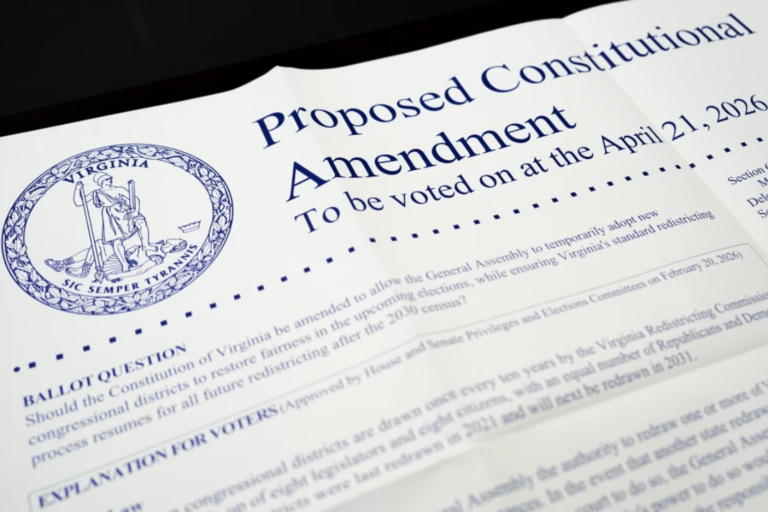 A poster on the Virginia redistricting referendum is seen during voting at Mason Square, Tuesday, April 21, 2026, in Alexandria, Va. (AP Photo/Julia Demaree Nikhinson)
