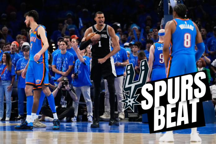 San Antonio Spurs forward Victor Wembanyama (1) celebrates after a dunk during the second overtime of Game 1 in a third-round NBA basketball playoffs series against the Oklahoma City Thunder Monday, May 18, 2026, in Oklahoma City. (AP Photo/Tony Gutierrez)