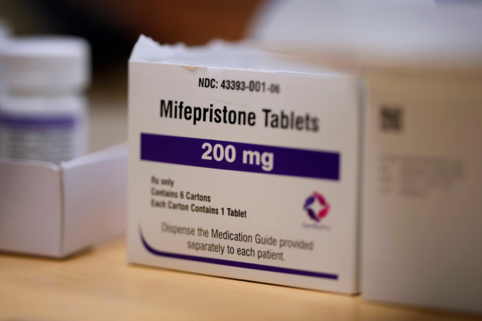 Mifepristone tablets sit on a table at a Planned Parenthood clinic in Ames, lowa, July 18, 2024. (AP Photo/Charlie Neibergall, File)