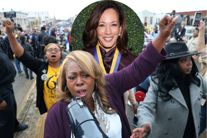 LaTosha Brown, co-founder of the voting rights group Black Voters Matter, lead people in a chant as they walk across Edmund Pettus Bridge as they commemorate the 60th anniversary of “Bloody Sunday” on March 09, 2025 in Selma, Alabama. (Photo by Michael M. Santiago/Getty Images)