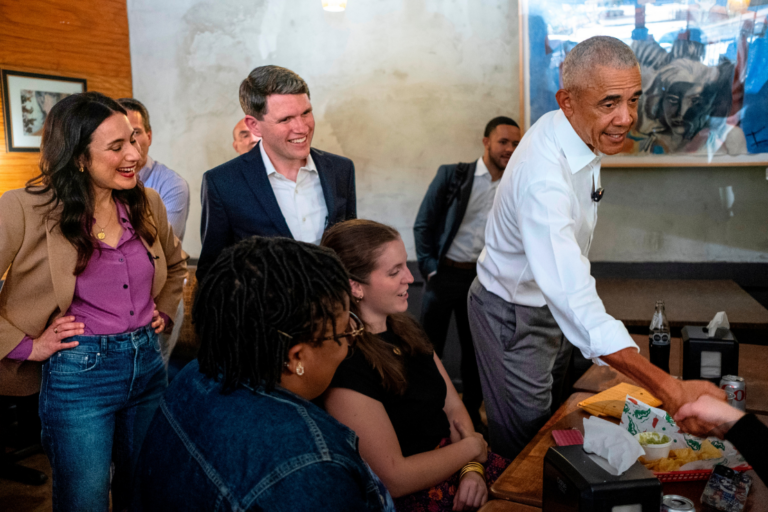 State Rep. Gina Hinojosa, left, state Rep. James Talarico, center, and former President Barack Obama, right, meet with diners during a stop for tacos in Austin, Texas. Photo: Associated Press
