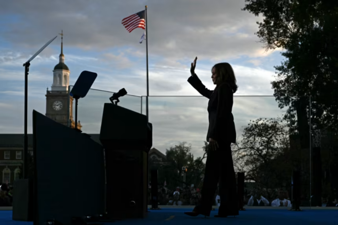 Vice President Democratic presidential candidate Kamala Harris waves at supporters as she walks off stage after speaking at Howard University in Washington, DC, on November 6, 2024. Brendan Smialowski/AFP/Getty Images