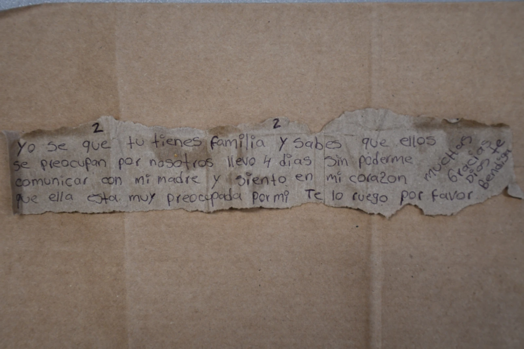 This photo provided by the Missouri State Highway Patrol shows a note written in Spanish by Immigration and Customs Enforcement detainee Brayan Rayo Garzon asking for a phone call with his mother, while he was in the Phelps County jail in Rolla, Mo., on April 7, 2025, shortly before he died by suicide. (Missouri State Highway Patrol via AP)