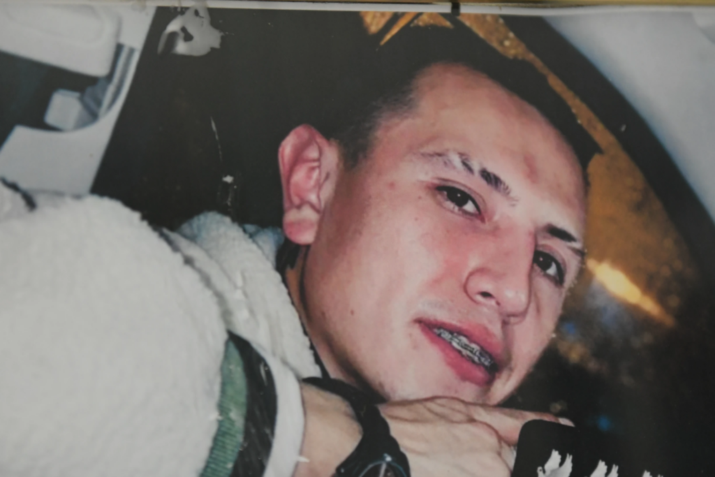 A photo of Brayan Rayo Garzon who died by suicide while in ICE custody in April 2025, is displayed in his mother’s apartment in St. Louis, on Friday, May 1, 2026. (AP Photo/Nick Ingram)