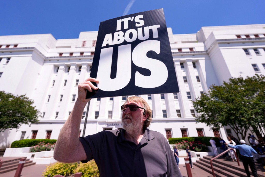 Randall Williams protests outside the Alabama state house during a special session of the Alabama Legislature, Monday, May 4, 2026, in Montgomery, Ala. (AP Photo/Mike Stewart)