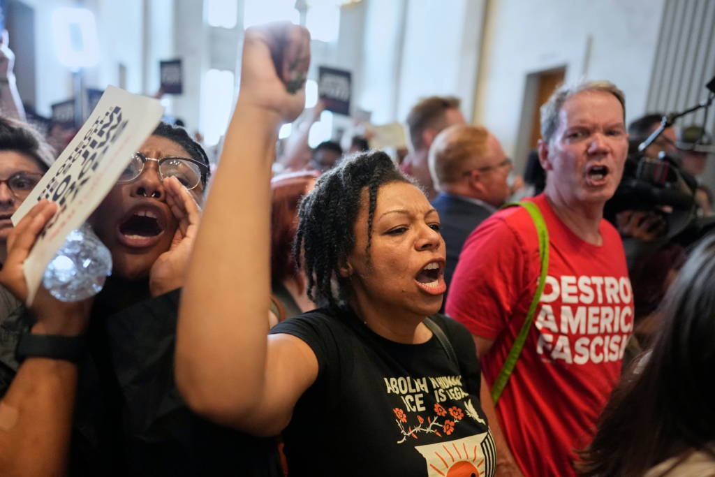 Protesters yell outside the chamber during a special session of the state legislature to redlaw US. Congressional voting maps, in Nashville, Tenn, Tuesday, May 5, 2026. (AP Photo/George Walker IN)