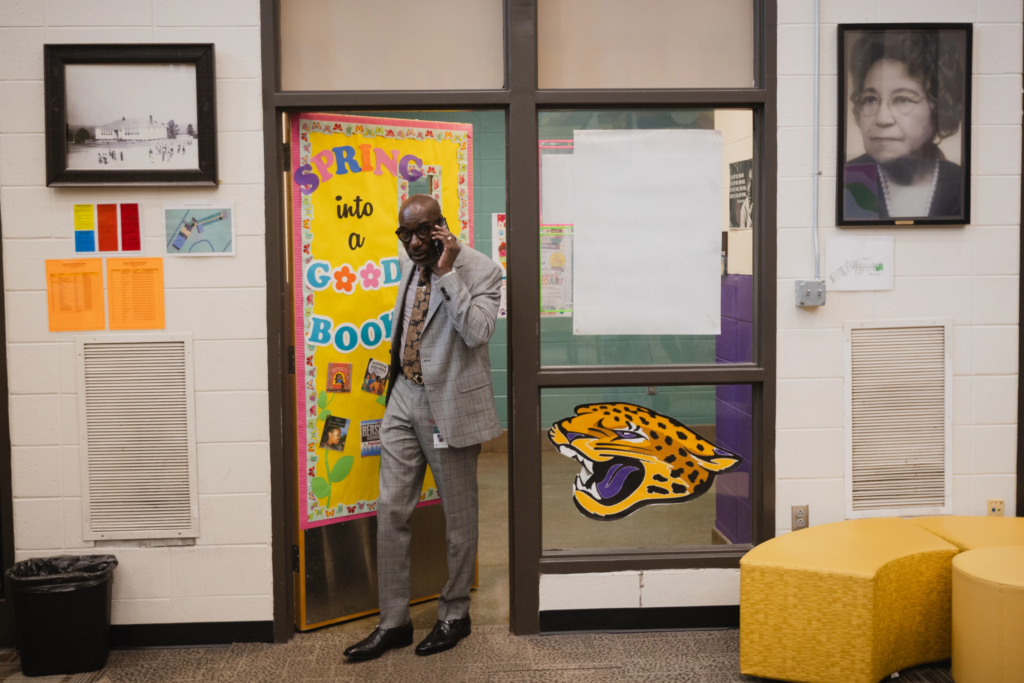 Birmingham City Schools Superintendent, Dr. Mark A. Sullivan, takes a call as he enters the library at Oxmoor Valley Elementary School in Birmingham, Ala, Wednesday, May 6, 2026. (Will McLelland/AL.com via AP)