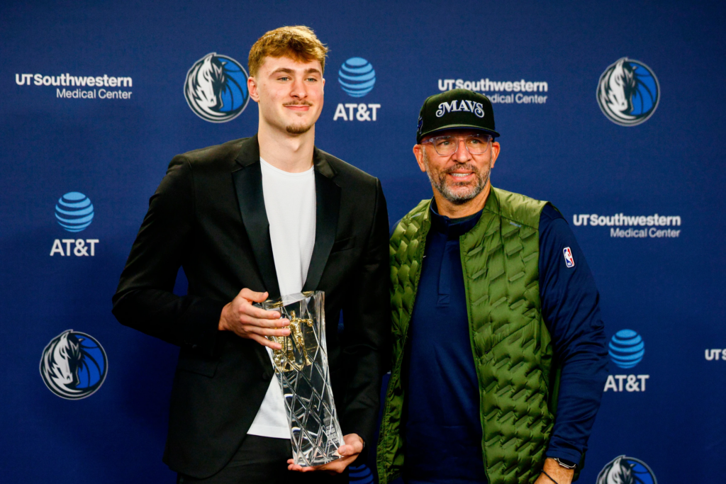 Dallas Mavericks forward Cooper Flagg poses for a photo with head coach Jason Kidd during a news conference after Flagg was named the 2025-26 NBA Rookie of the Year, Wednesday, April 29, 2026, In Dallas. (Ellas Valverde II/The Dallas Morning News via AP)