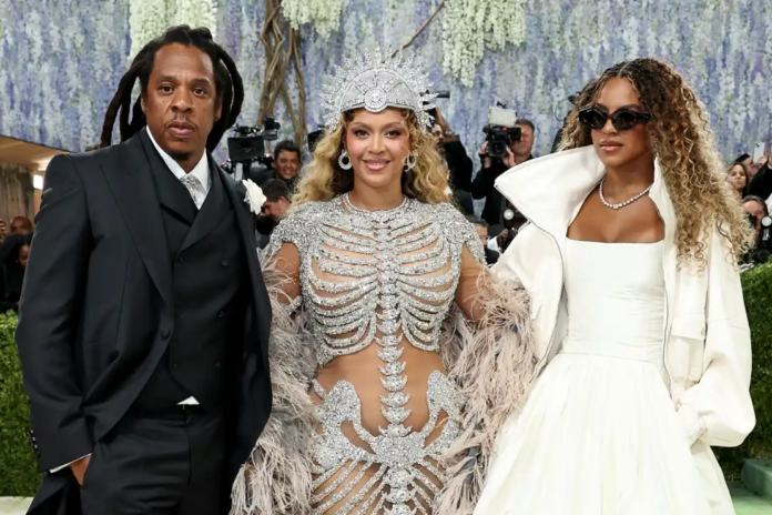 Blue Ivy Carter, Jay-Z, and Beyonce at the 2026 Met Gala. Credit : Kevin Mazur/MG26/Getty