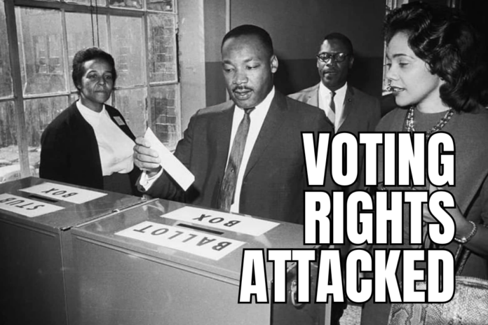 King casts his ballot in Atlanta in 1964, while his wife, Coretta, waits. (Bettman / Getty)