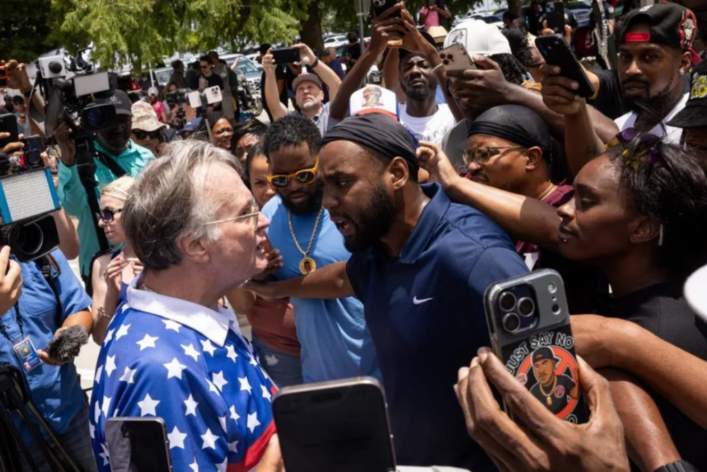 Supporters of Austin Metcalf and Karmelo Anthony clash outside of the Collin County Courthouse on Tuesday, June 9, 2026. Credit: The Dallas Morning News via Getty Images