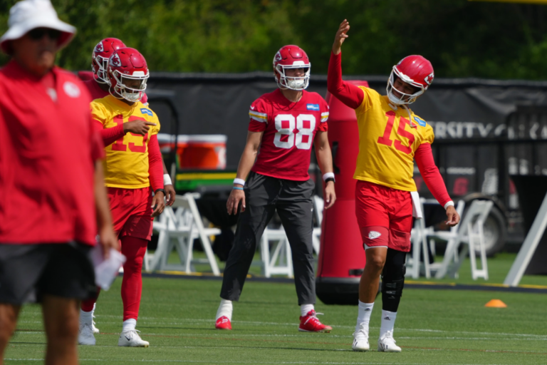 Kansas City Chiefs quarterback Patrick Mahomes (15) signals teammates during the NFL football team's practice Wednesday, June 10, 2026, in Kansas City, Mo. (AP Photo/Ed Zurga)