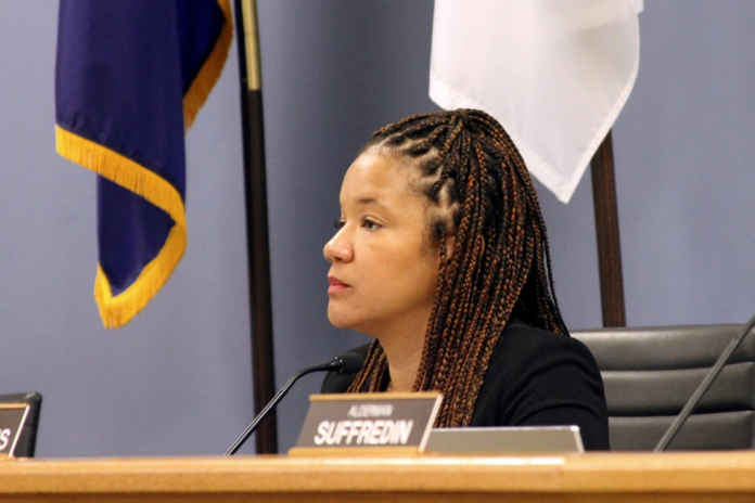 In this Nov. 25, 2019 file photo, Alderman Robin Rue Simmons, 5th Ward, proposes a reparations fund during a City Council meeting in Evanston, lll. (Genevieve Bookwalter/Chicago Tribune via AP,File)
