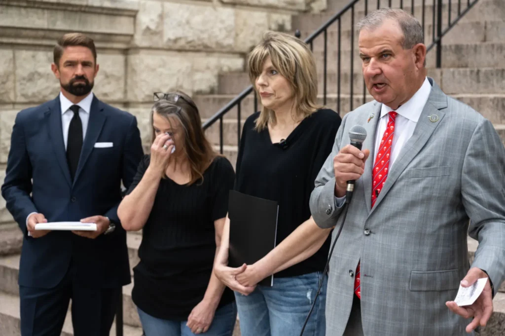 State Rep. Pat Curry, R-Waco, at right, speaks about the plea agreement in the Adam Hoffman case during a press event at the McLennan County Courthouse last Friday. Also shown are, from left, state Rep. Jeff Leach, R-Allen, Sheri Hykel and Melissa Dieterich.