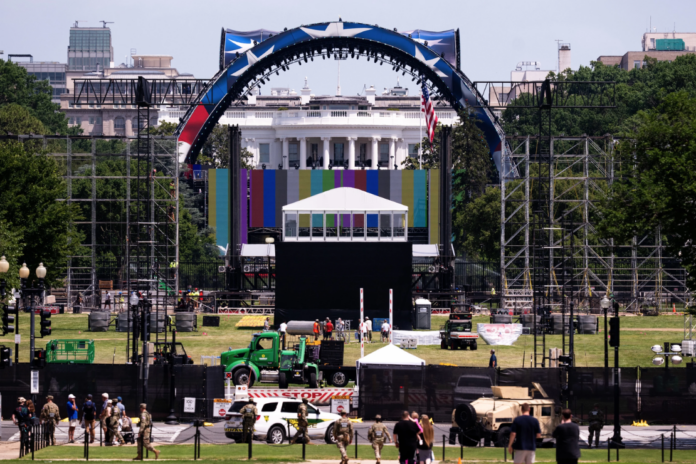 Construction continues on the arena on the South Lawn of the White House for a future UFC mixed martial arts fight, Saturday, June 6, 2026, in Washington. (AP Photo/John McDonnell)