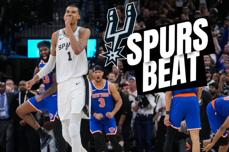 San Antonio Spurs forward Victor Wembanyama walks off the court as time expires during the second half of Game 2 of the NBA Finals basketball series as New York Knicks guard Landry Shamet (44), guard Josh Hart (3), and center Mitchell Robinson (23) celebrate, Friday, June 5, 2026, in San Antonio. (AP Photo/Eric Gay)
