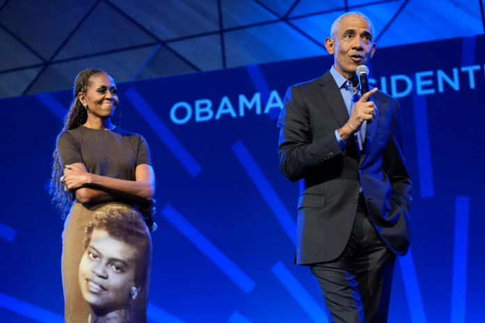 Former First Lady Michelle Obama and President Barack Obama at the Obama Presidential Center in Chicago on June 16, 2026. (Credit: Pablo Martinez Monsivais / POOL / AFP via Getty Images)