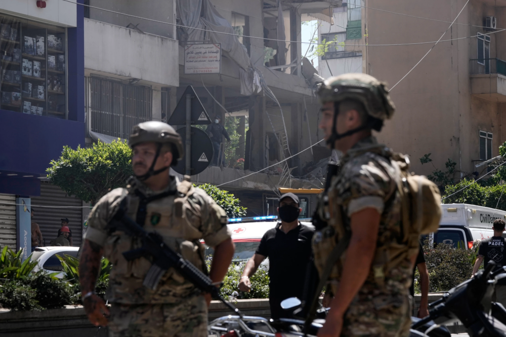 Lebanese soldiers stand guard at the site of an Israeli airstrike that struck an apartment in Dahiyeh, Beirut’s southern suburbs, Lebanon, Sunday, June 14, 2026. (AP Photo/Bilal Hussein)