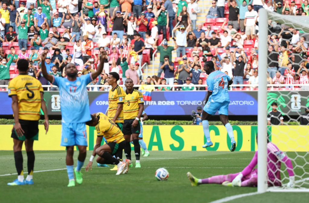DR Congo's defender #04 Axel Tuanzebe (R) celebrates after scoring a goal in extra time during the 2026 FIFA World Cup qualifiers final playoff football match between the Democratic Republic of the Congo and Jamaica at the Akron Stadium in Zapopan, Jalisco state, Mexico, on March 31, 2026. (AFP)