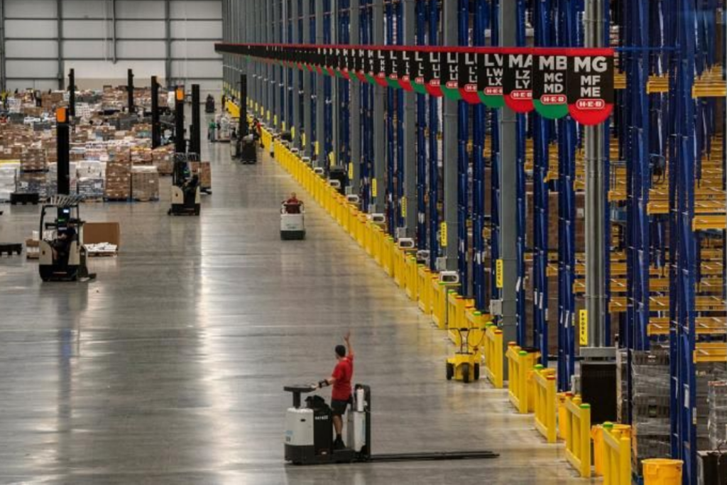 H-E-B employees work at the new super-regional warehouse in San Antonio on March 21, 2020. Photograph by Tamir Kalifa